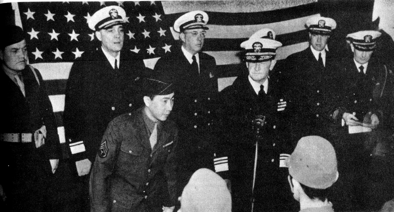 OMINATO NAVAL BASE, Japan, September 10, 1945: MIS linguist William Wada translates as a U.S. Navy delegation accepts the surrender of Japanese forces in Northern Honshu.